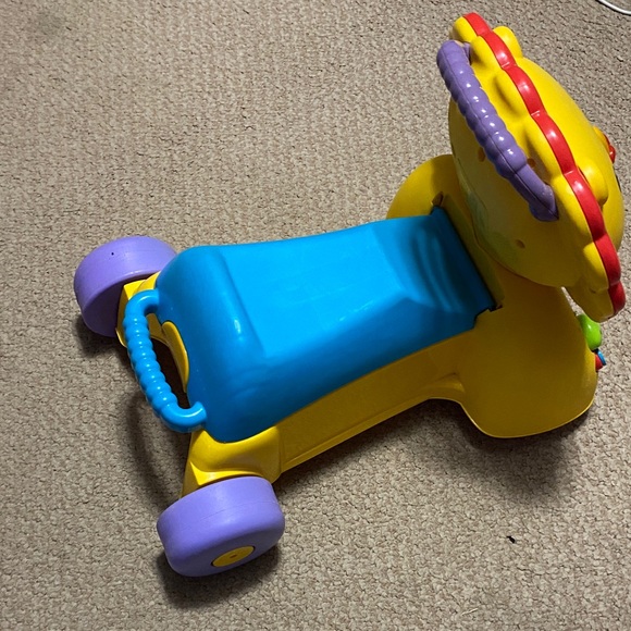 Fisher-Price 3-in-1 Sit, Stride &
Ride Interactive Lion - Picture 7 of 17